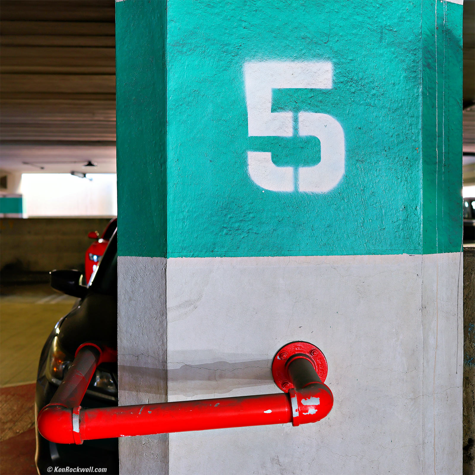 Red and Green Number five in parking structure at SDSU
