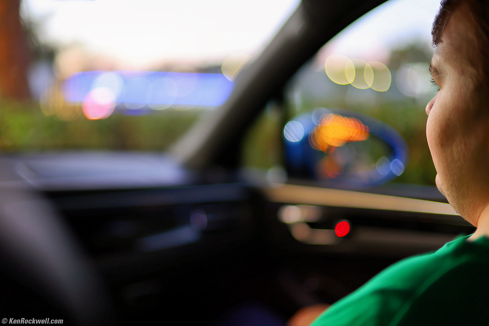 Ryan in the Porsche coming home from school in the evening bokeh
