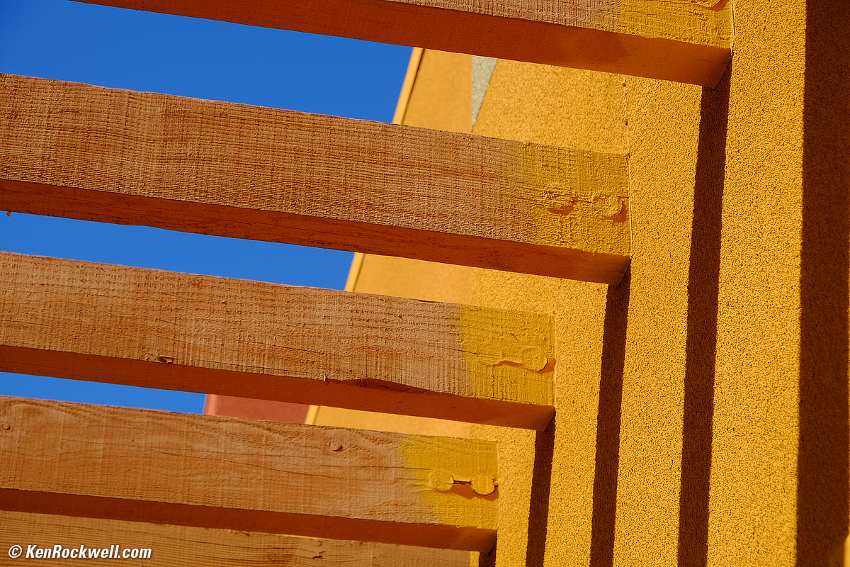 Orange Stucco, Wooden Beams and Sky
