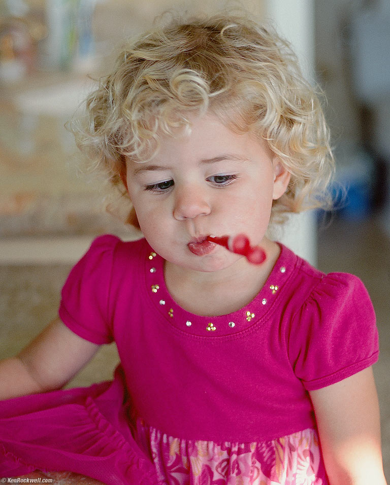 Katie sort of brushing her teeth