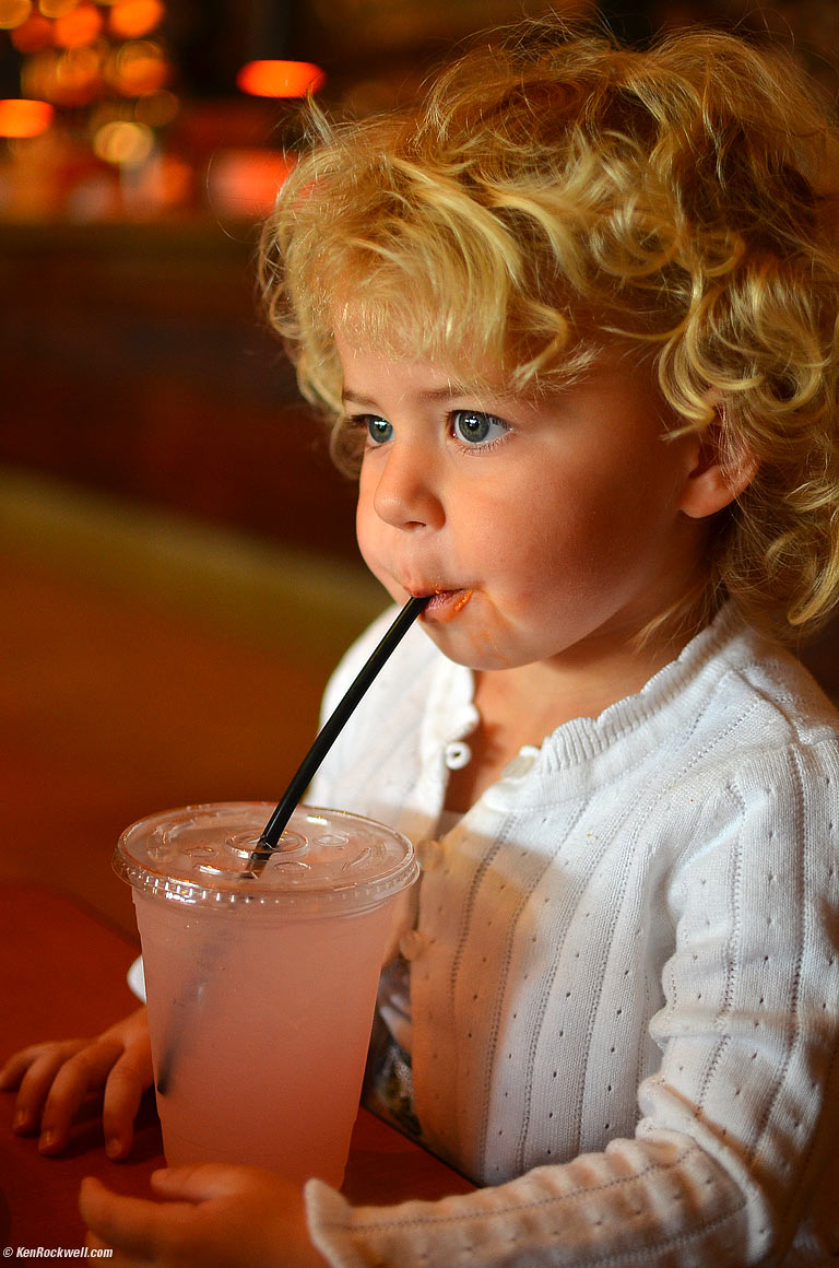 Pizza-faced Katie enjoying her lemonade at Mangia Bene