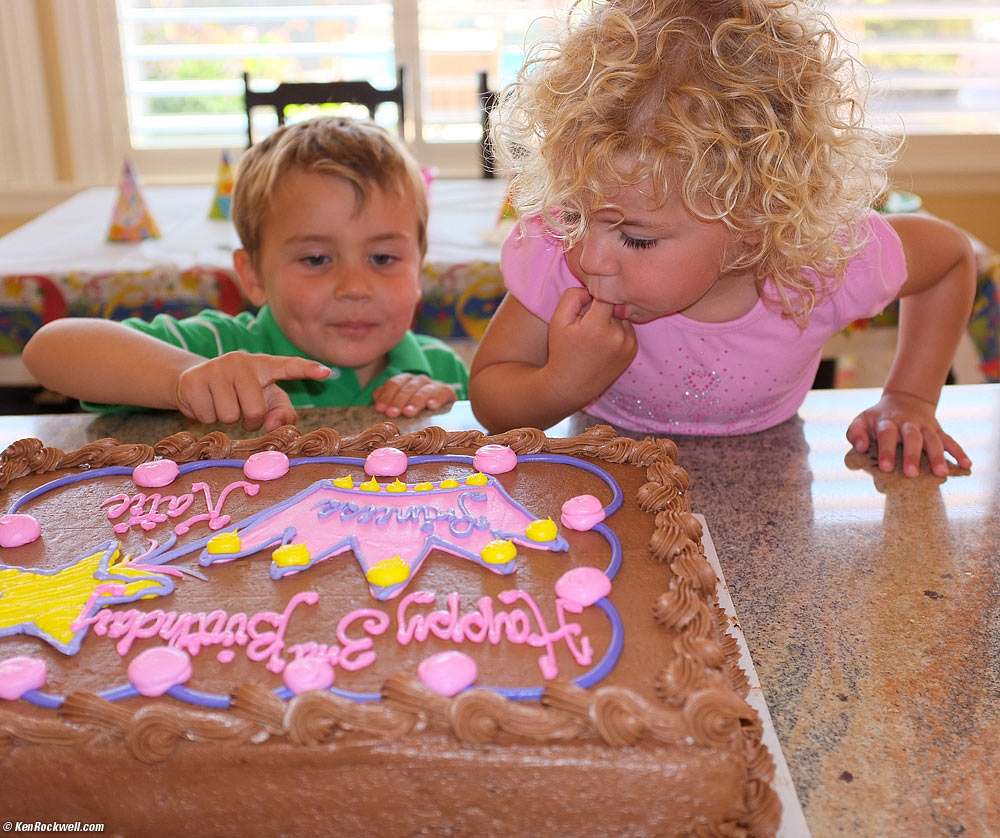 Ryan and Katie sneaking some cake