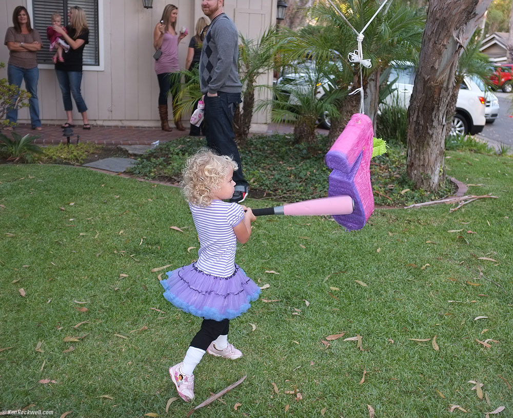 Pummeling the Pi&ntilde;ata at Skyler's birthday party