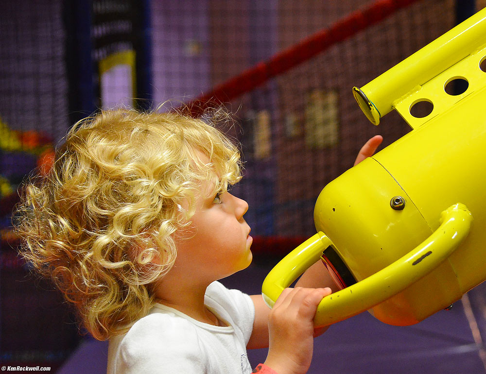 Katie loads the ball gun.