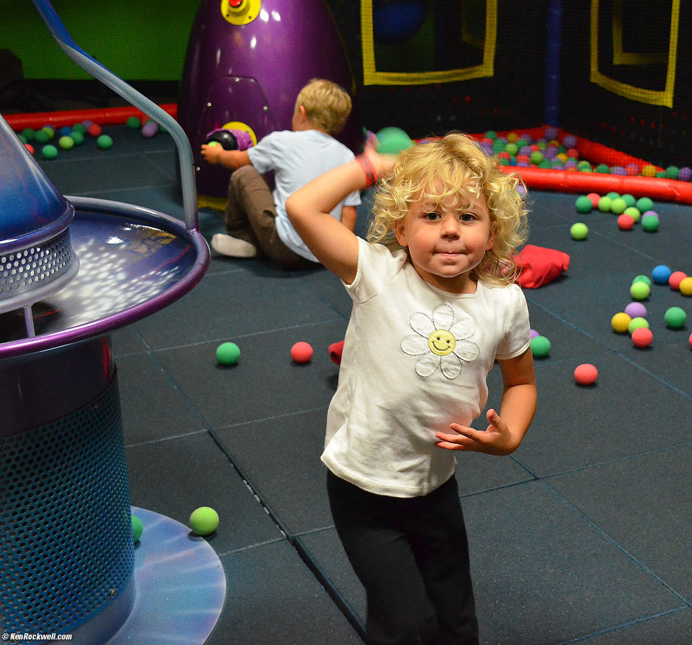 Katie throws a ball at Dada