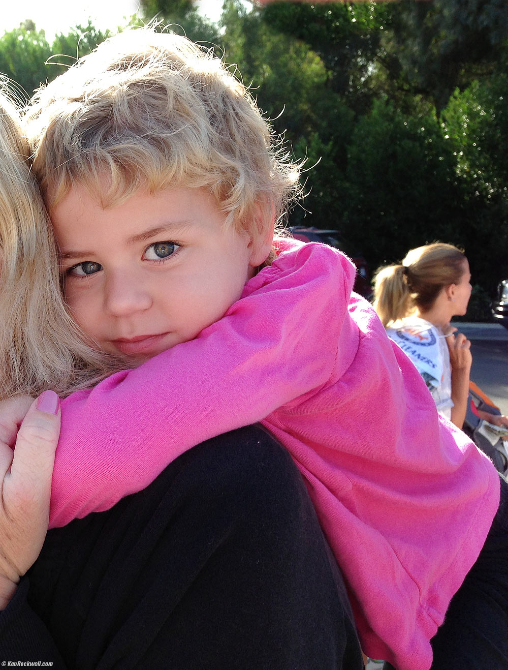Katie on Mom's back.