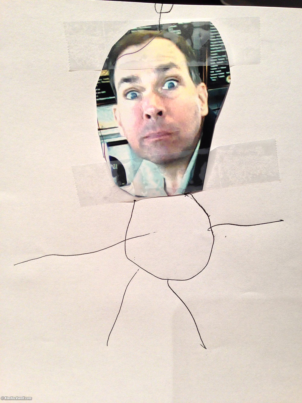 Katie traces Dada's hand