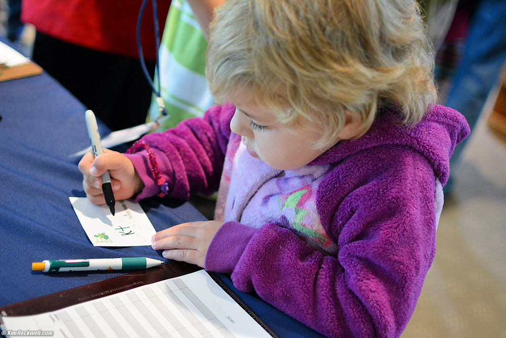 Katie signs-in to her first day of Sunday School.