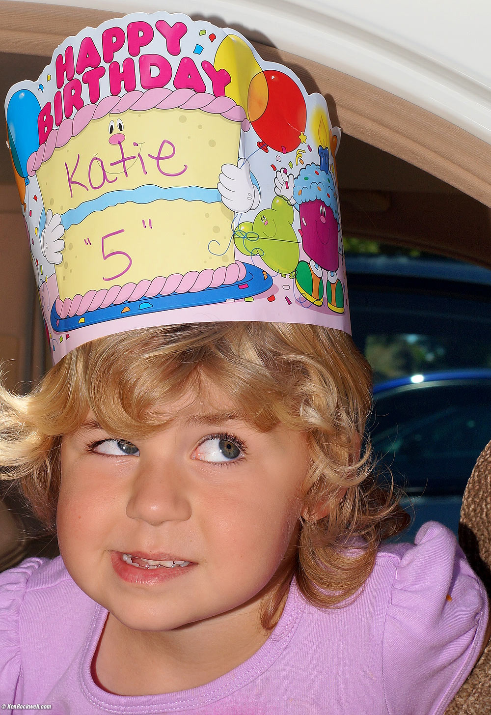 Katie and her birthday hat from school.