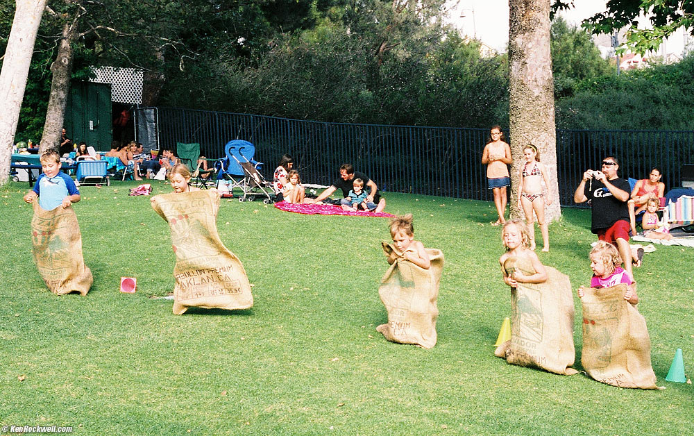 Ryan and Katie in the sack race at Noni's pique-nique, Lake Mission Viejo