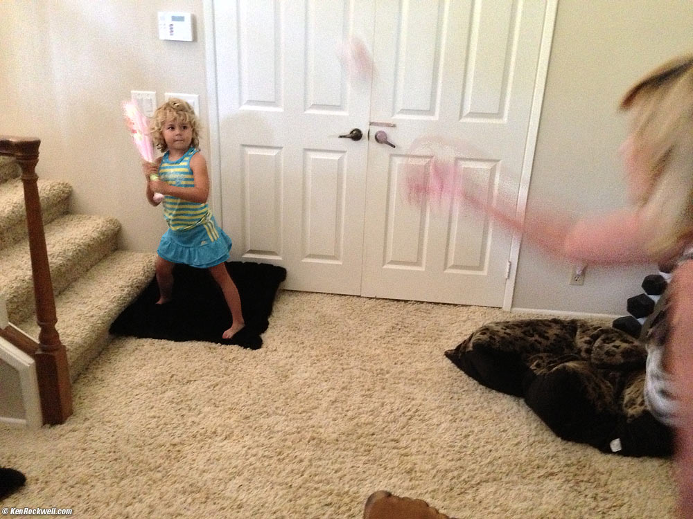 Katie plays baseball at Noni's.