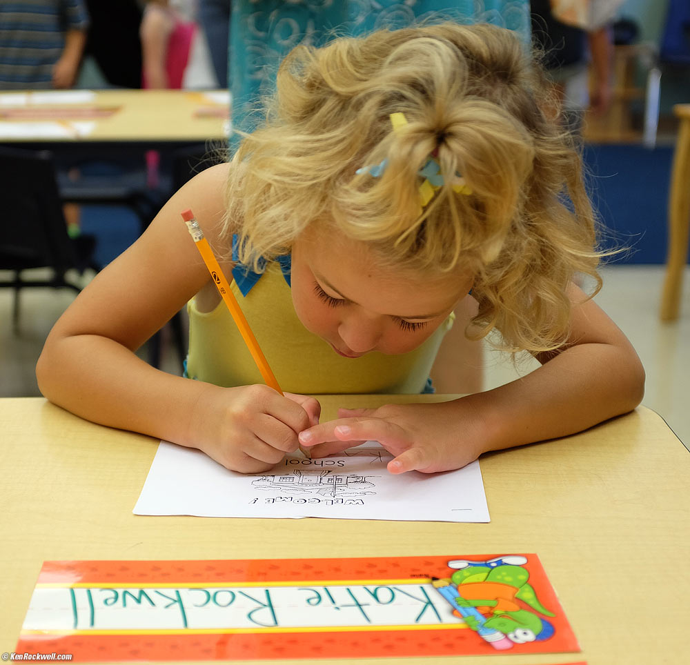 Katie checkish out the fish tank in the office