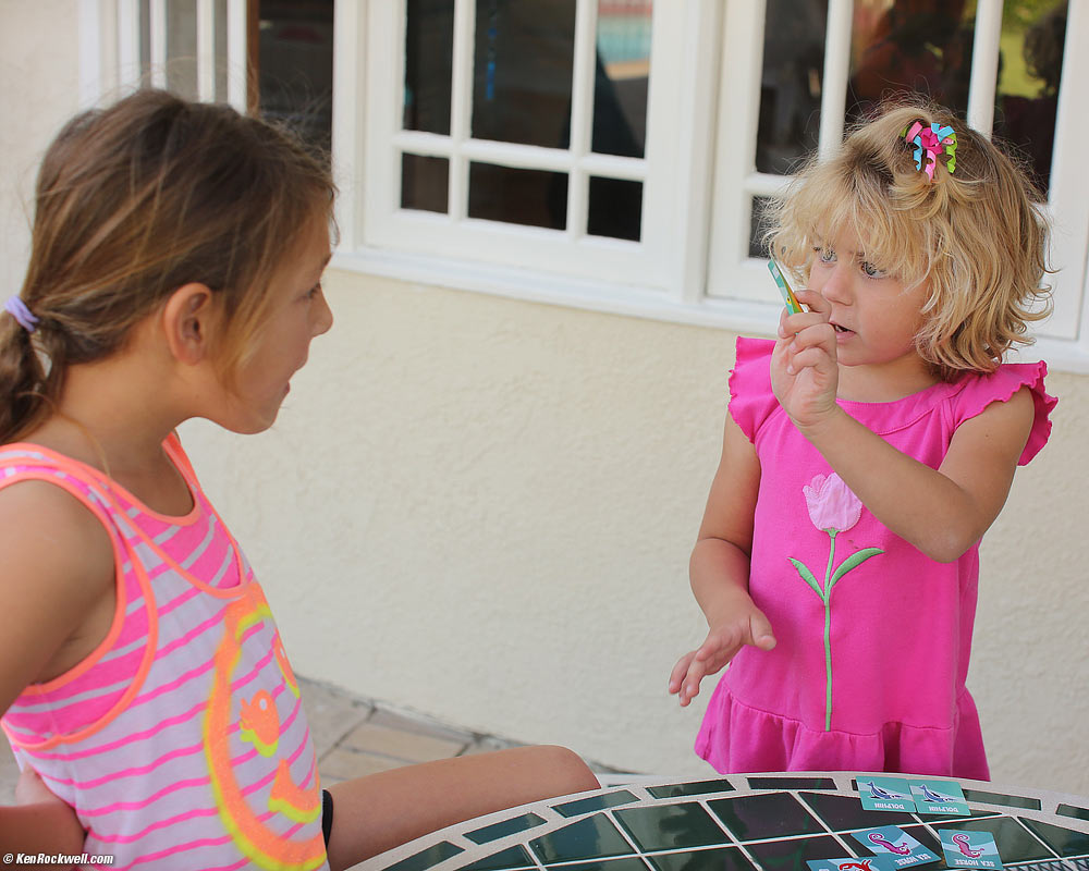 Katie plays Go Fish at Suzi's