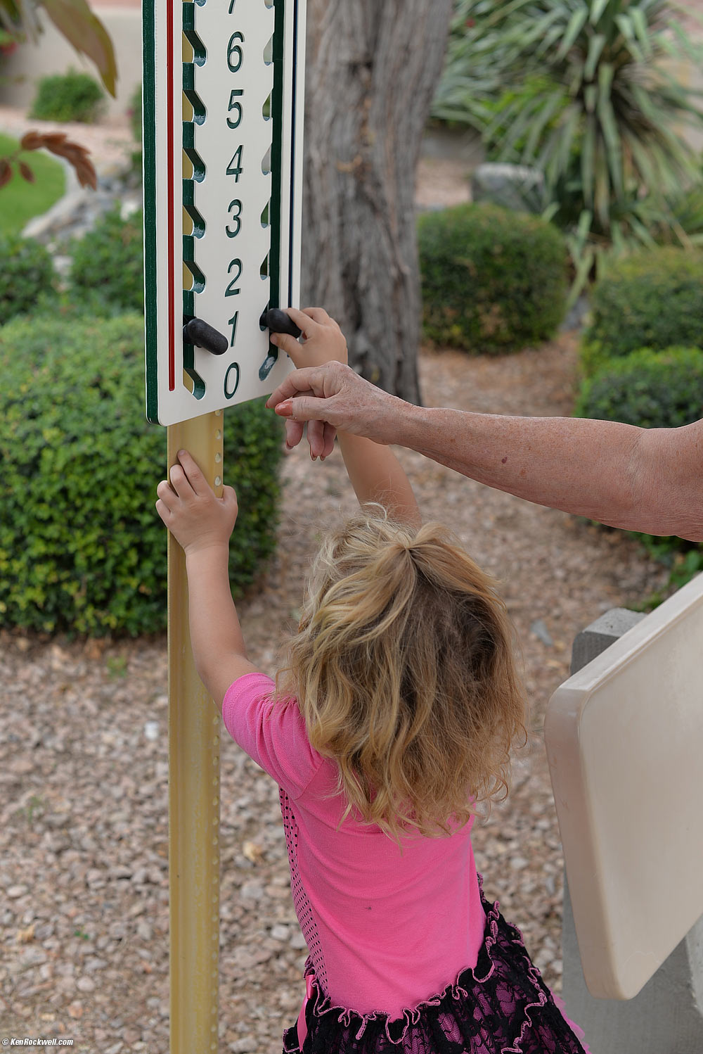 Katie tabulates the bocce ball score