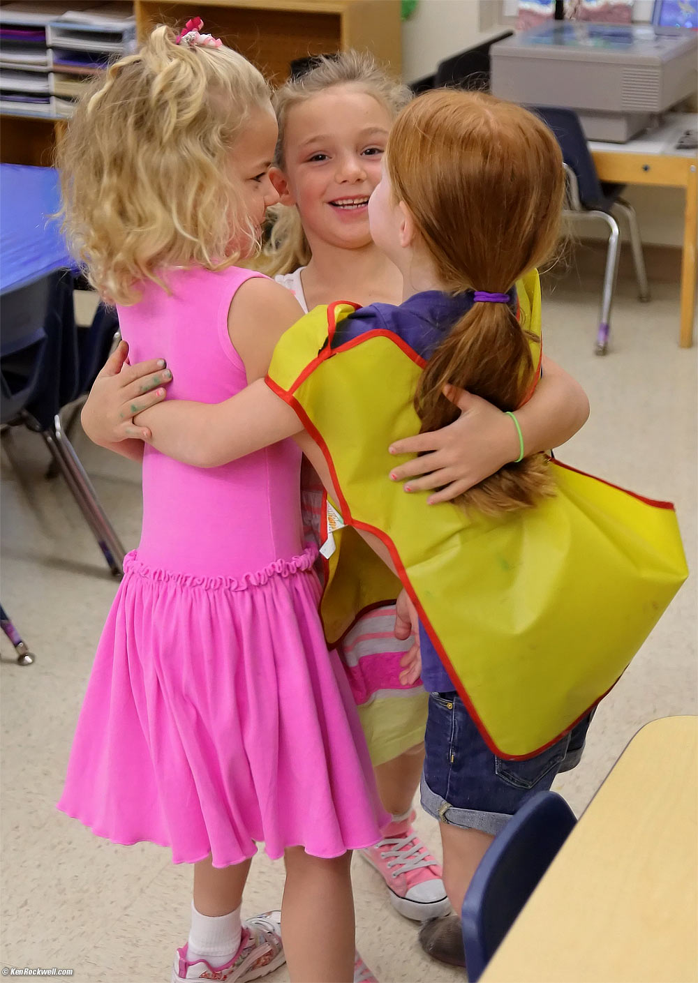 Katie gives group hugs as she arrives at Early Birds