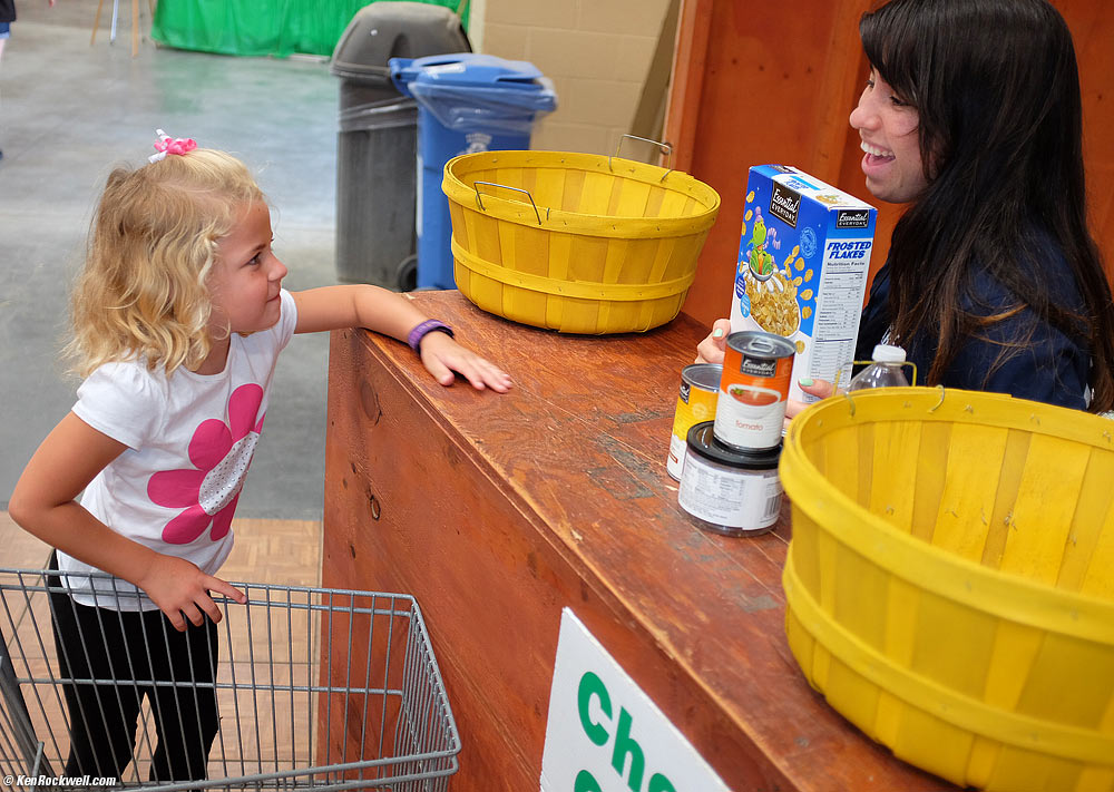 Katie shops at the kid's market at the county fair