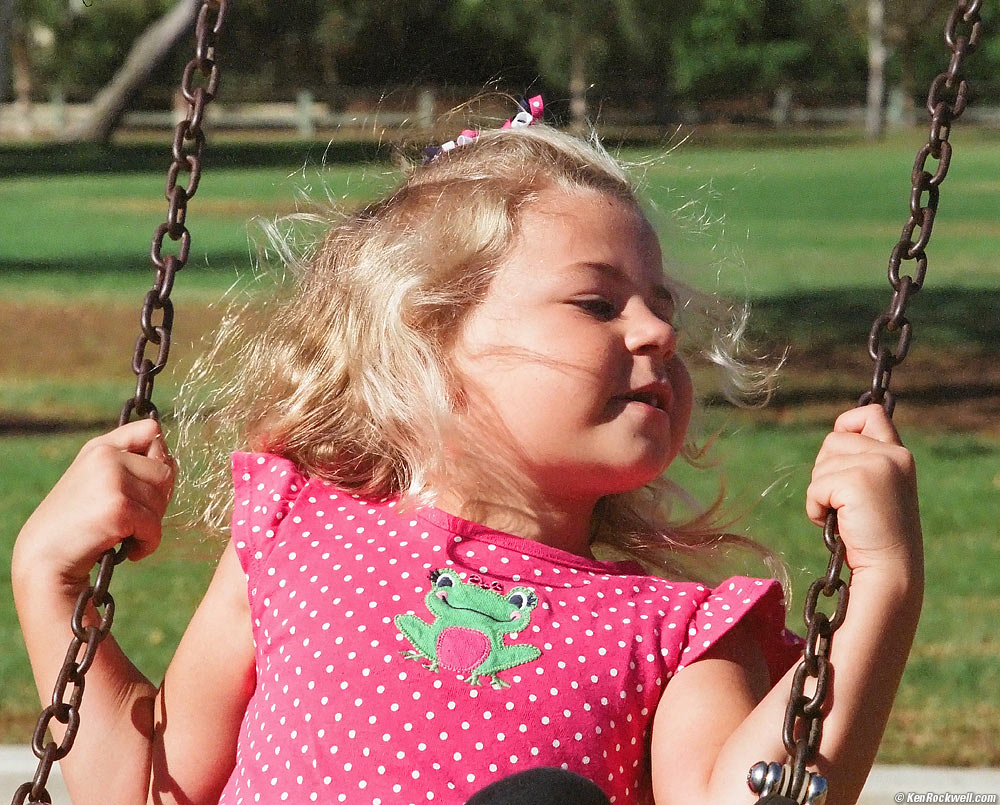 Katie on the swings at Noni's park