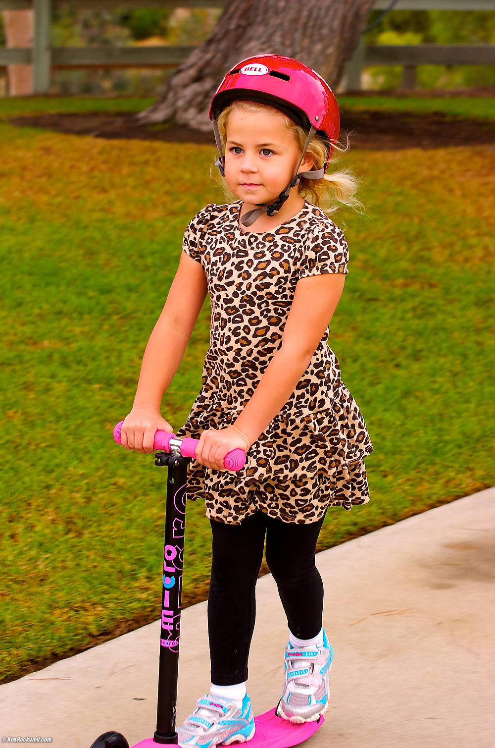 Katie rides her Mini Micro Scooter at Noni's park.