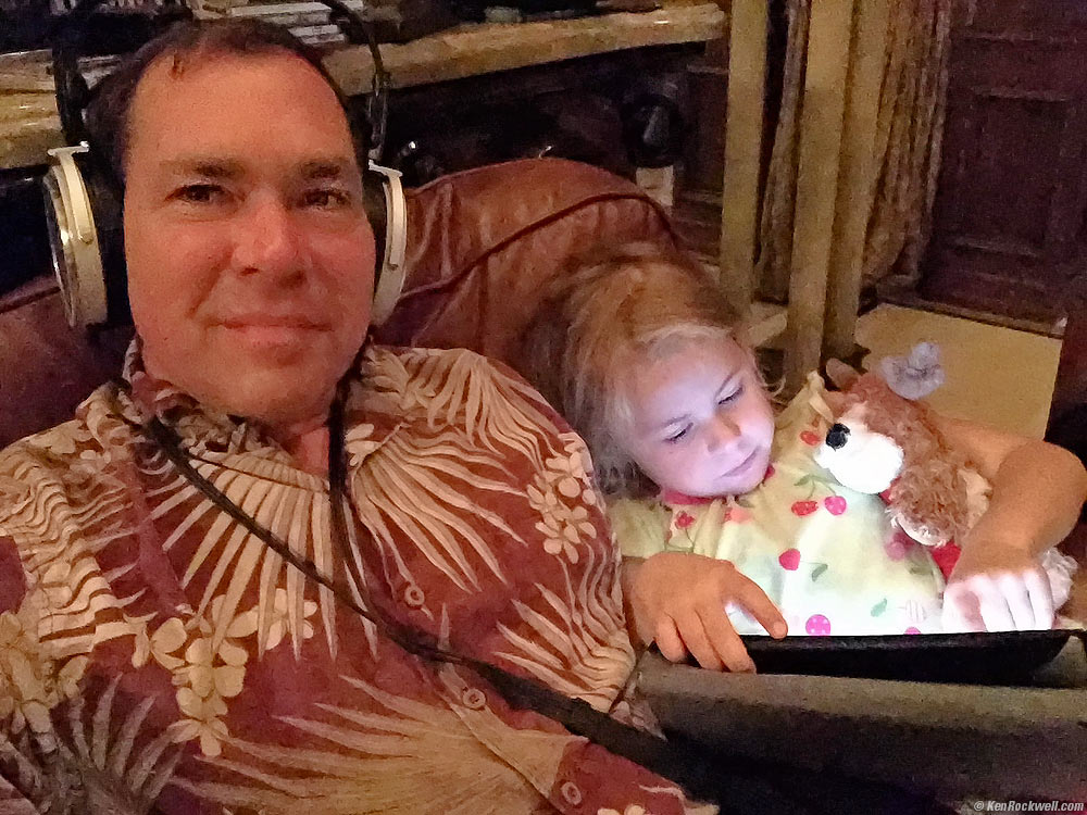 Katie playing on her iPad with Dada in Dada's Radio Room.