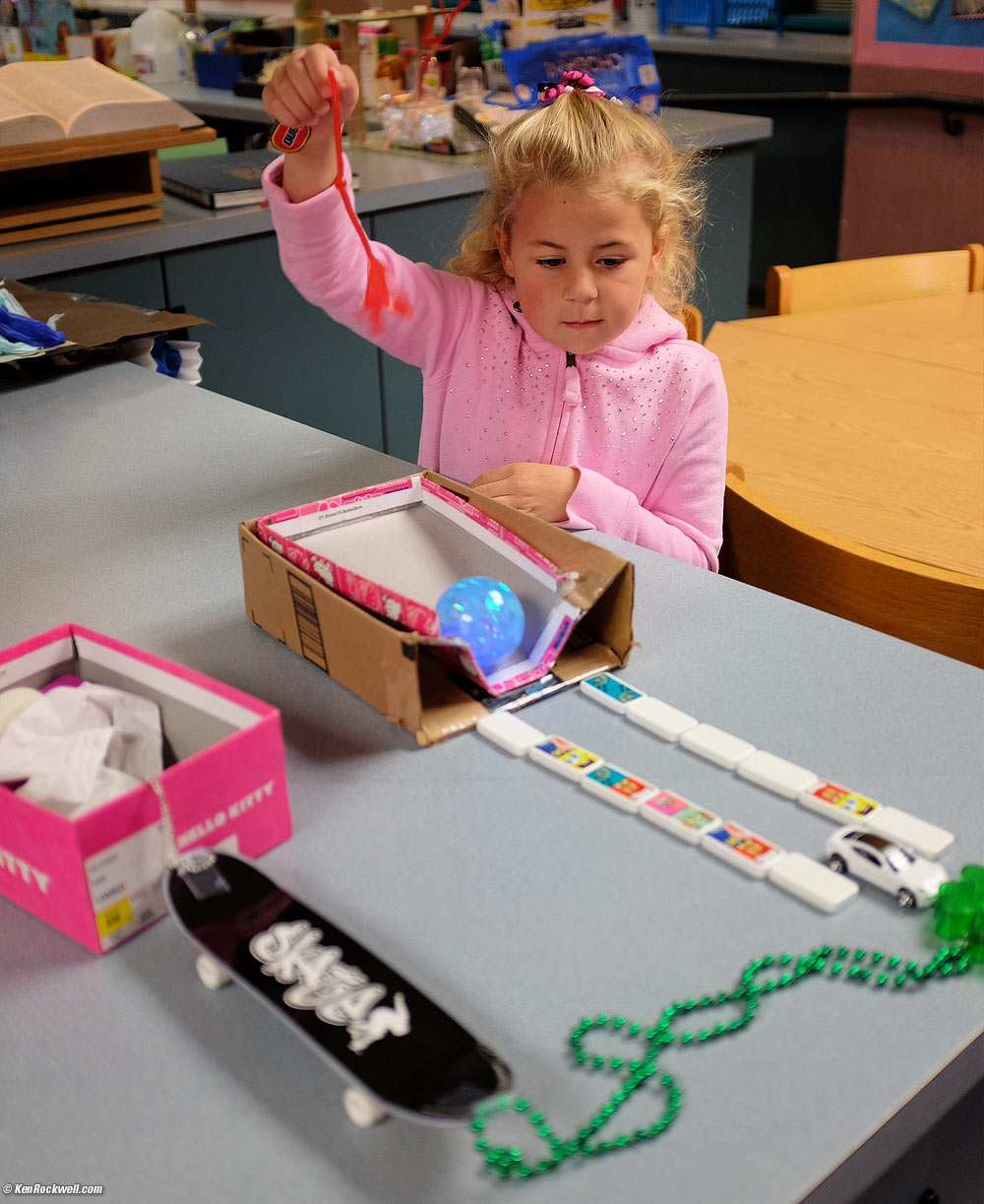 Katie demonstrates her Rube Goldberg machine two times successfully