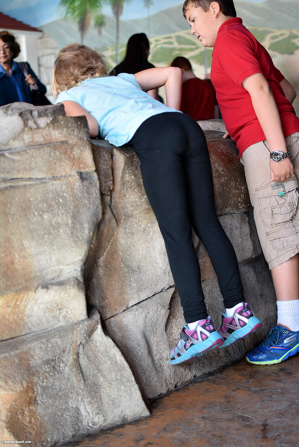 Katie is still so short she often needs a lift to wash her hands or peer over the edge