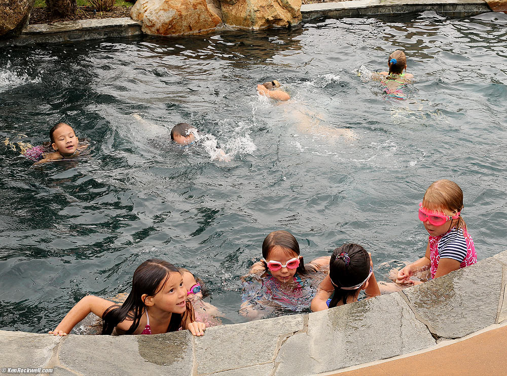 Katie in the pool with her friends