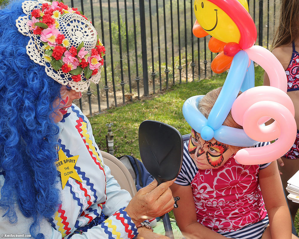 Katie checks her painted face