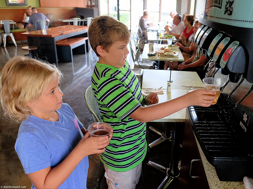 Kids at the drinking fountain. 