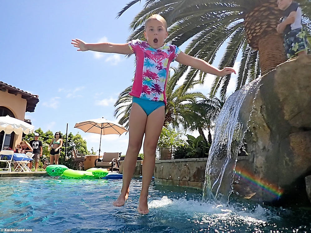 Katie jumps into the pool