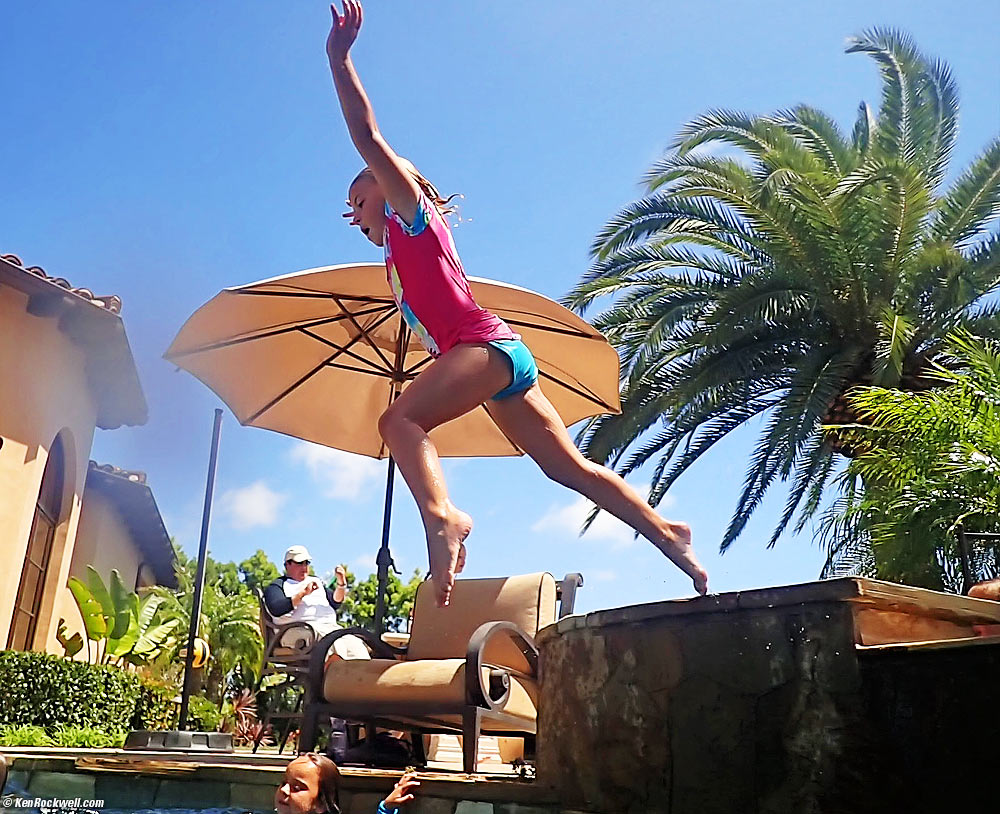 Katie jumps into the pool