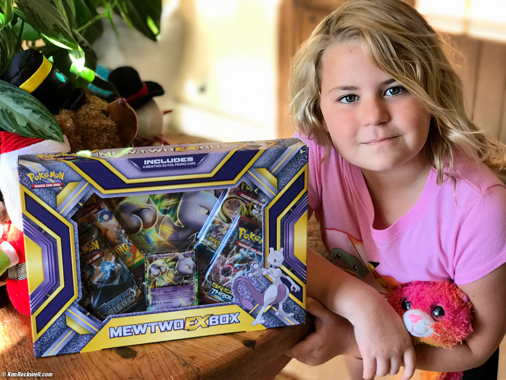 Katie is all excited about her Pokemon cards.