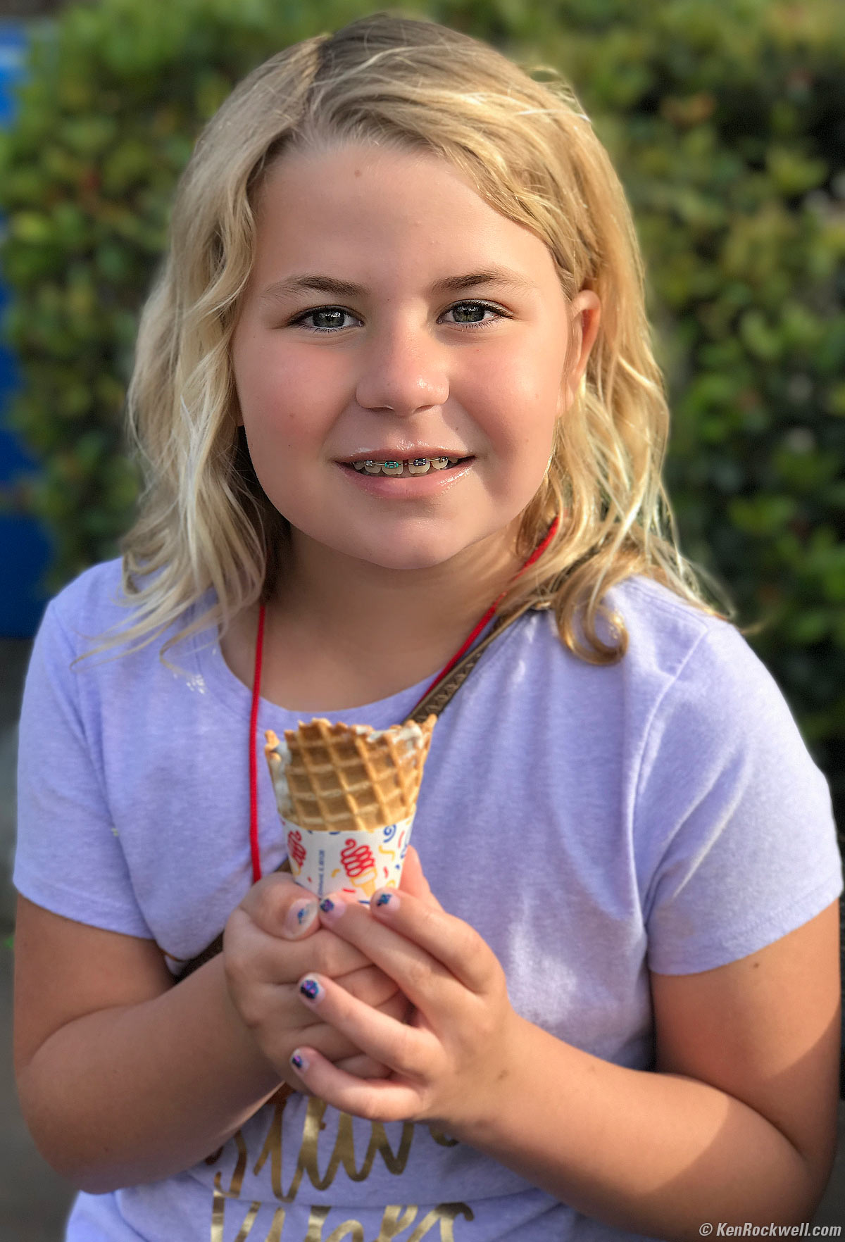 Katie has an ice cream cone at Legoland