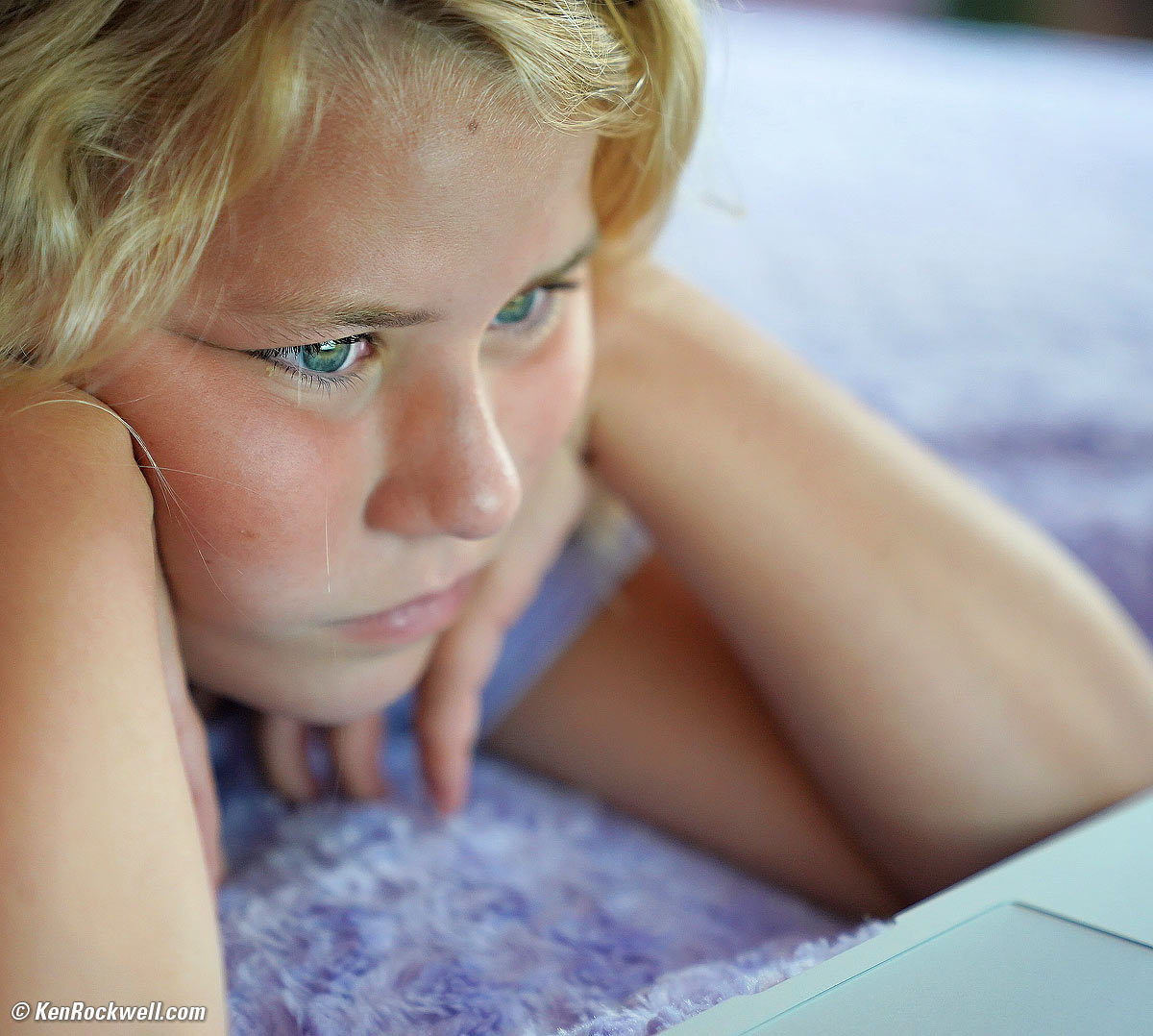 Katie watches her MacBook Air