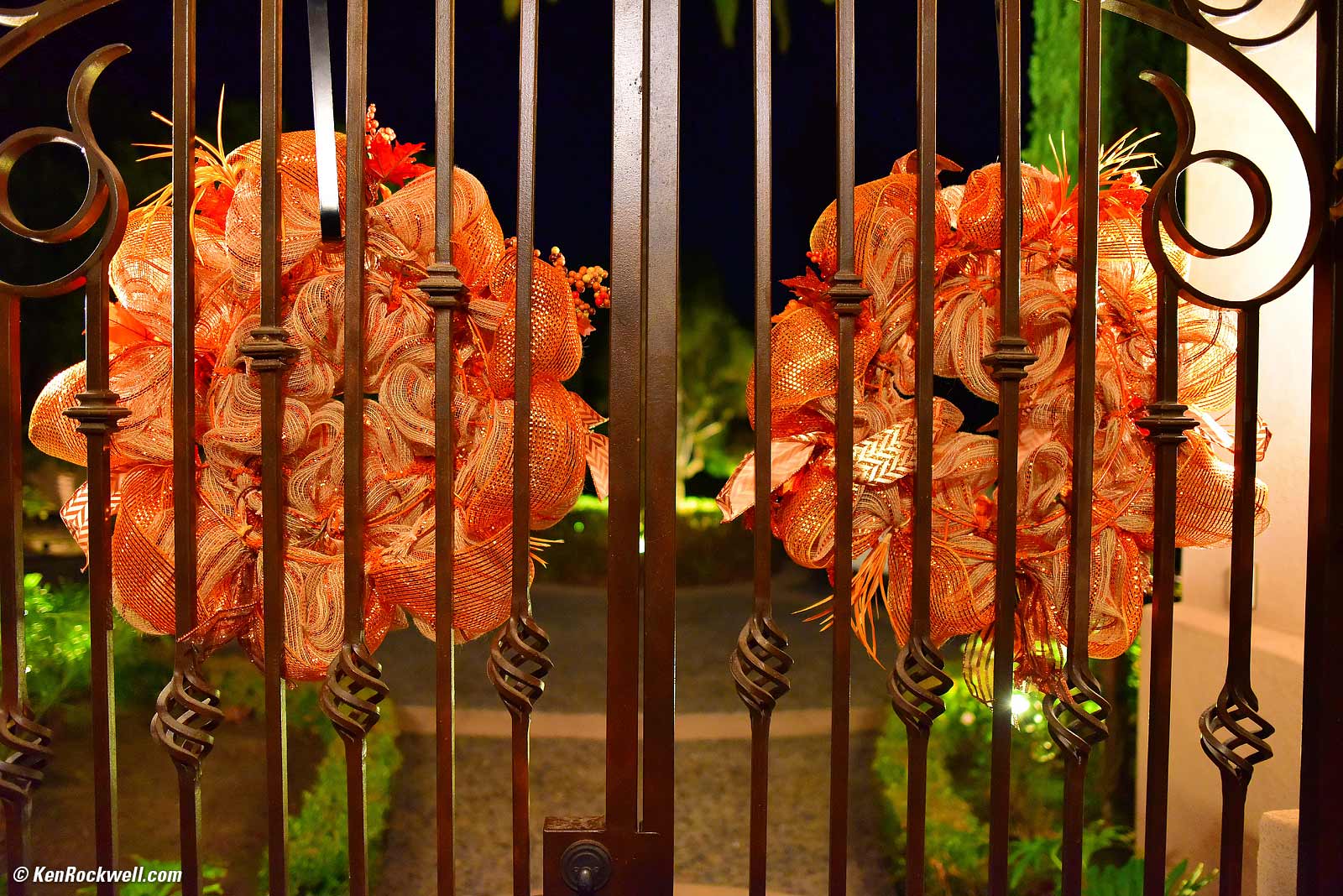 Wrreaths lit at night from behind