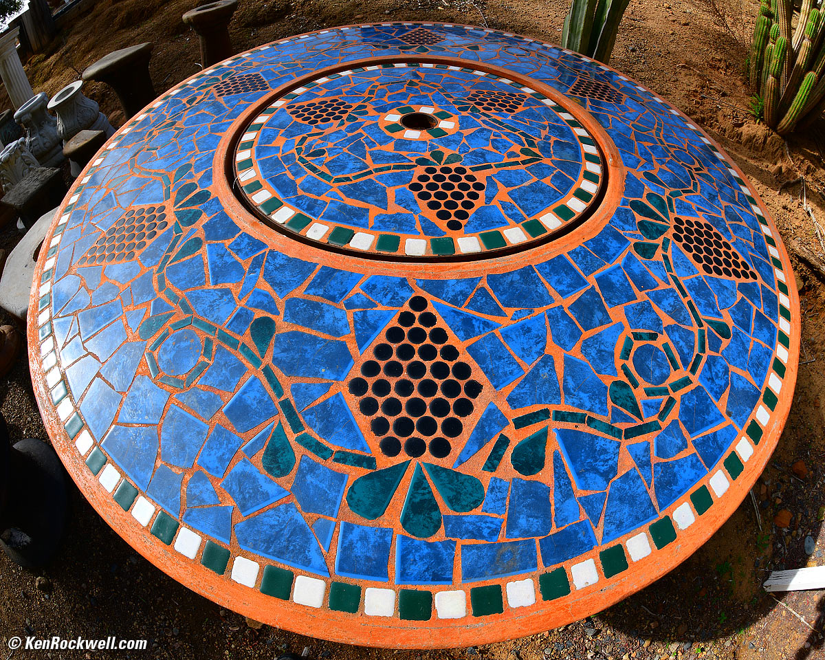 Blue and orange concrete and tile lunch table