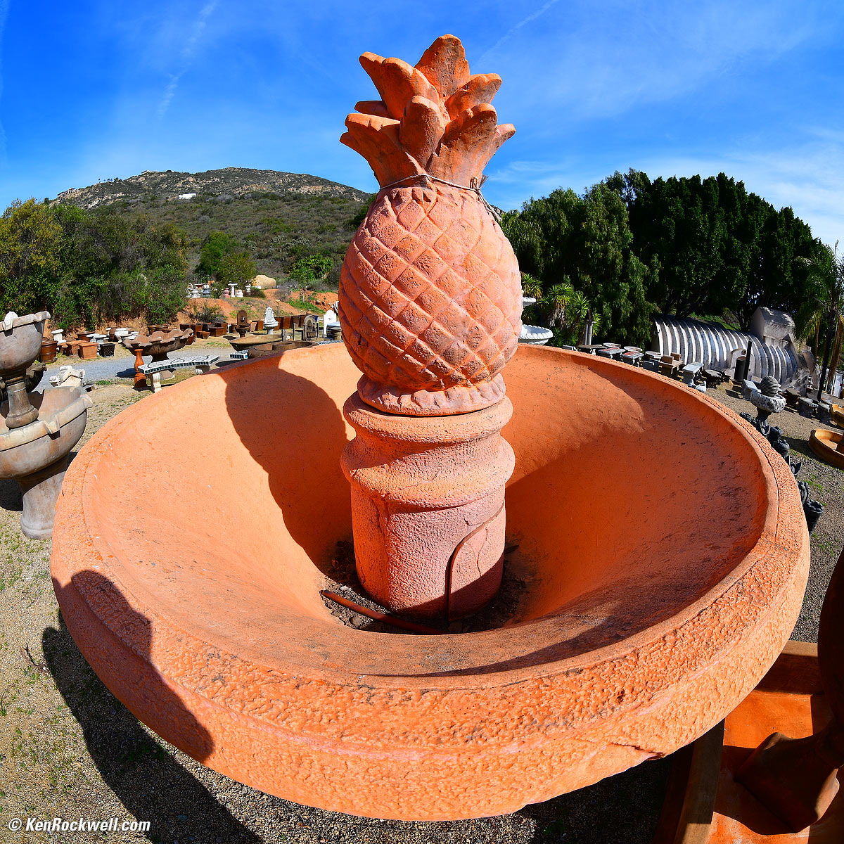 Orange Fountain against Blue Sky