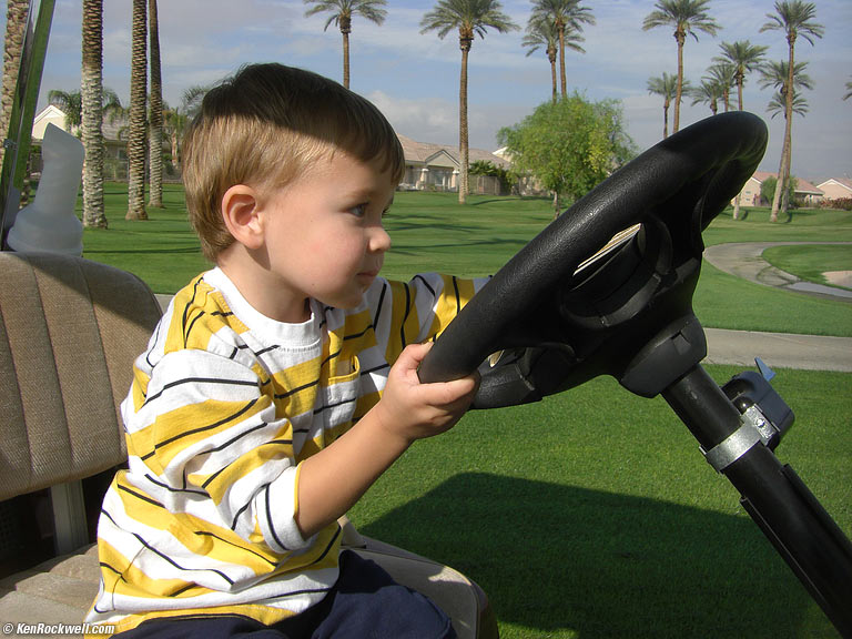 Ryan driving Golf Cart