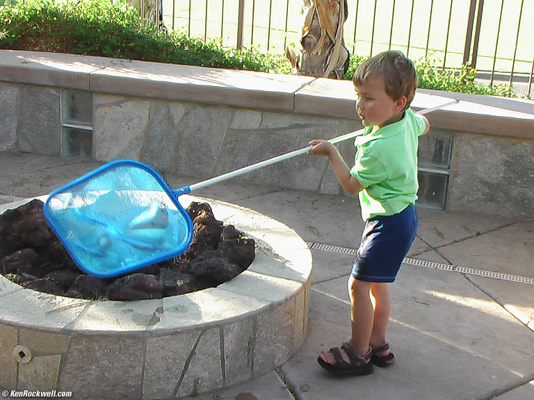 Ryan cleaning the pool
