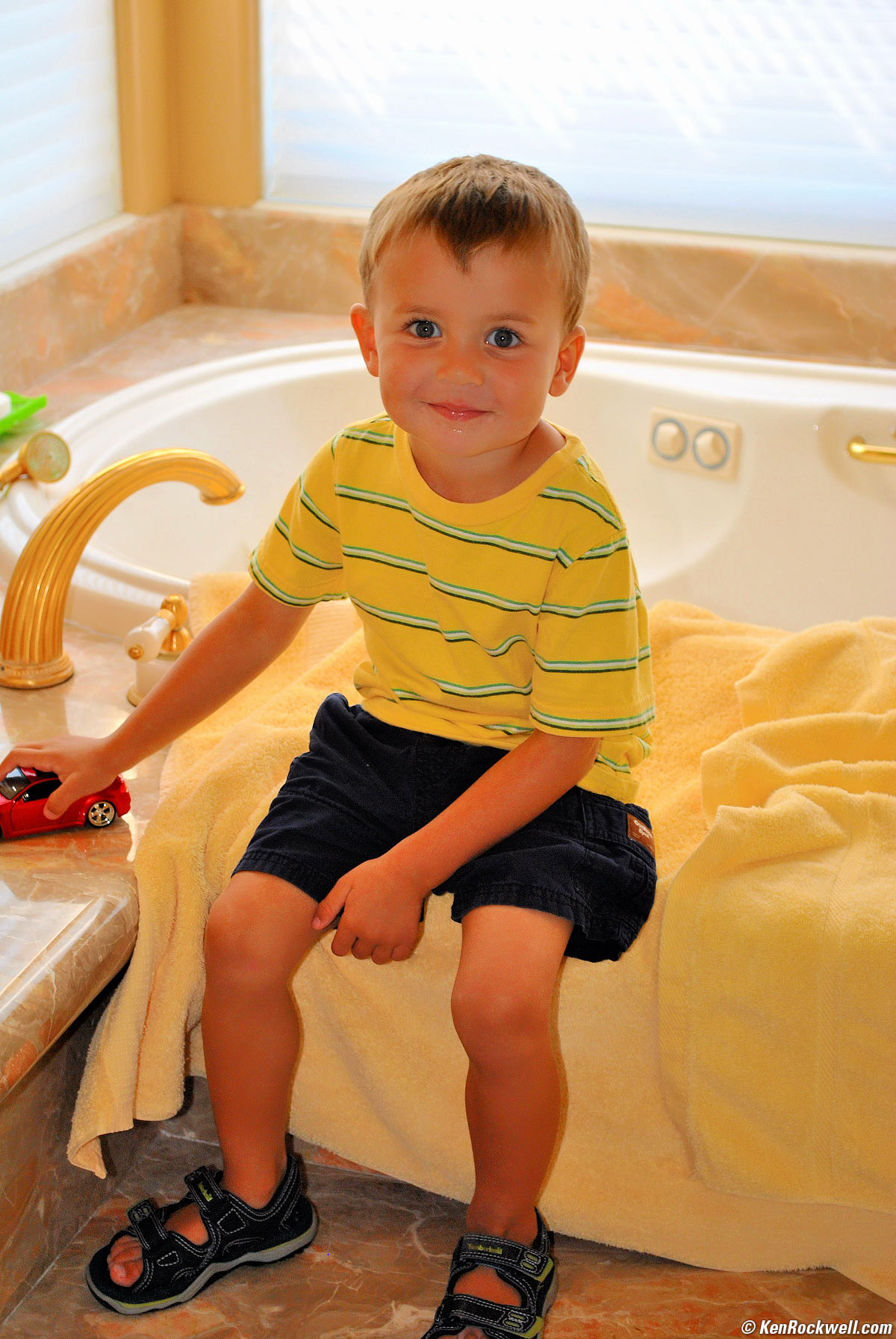 Ryan on the tub with car
