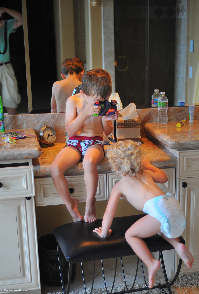 Dada takes a picture of Ryan taking picture of Katie with his Nickelodeon Photo Blaster 144-shot camera. Say CHEESE!