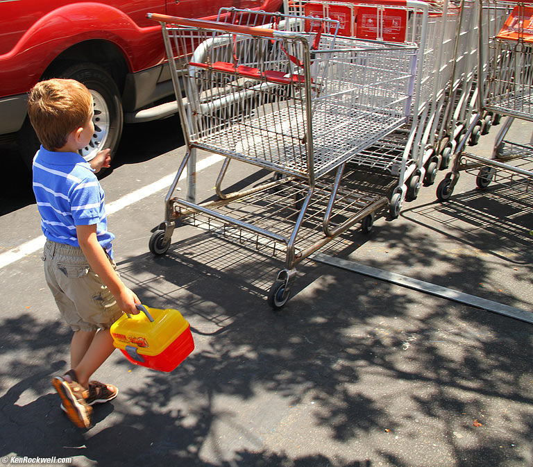 Ryan choosing a cart at Price Club.