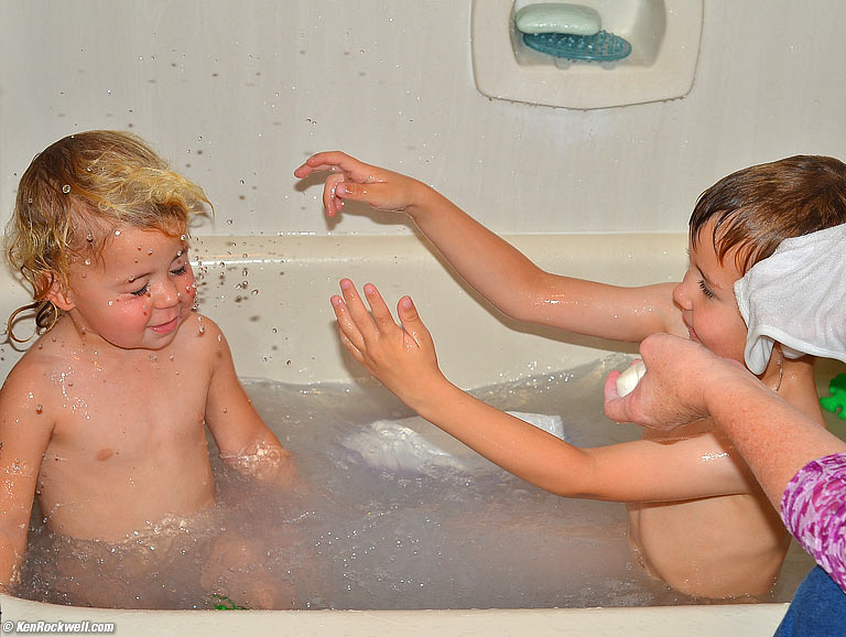 Ryan splashes Katie.