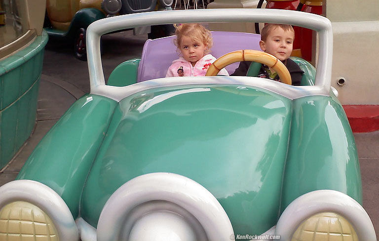 Ryan driving katie in the convertible