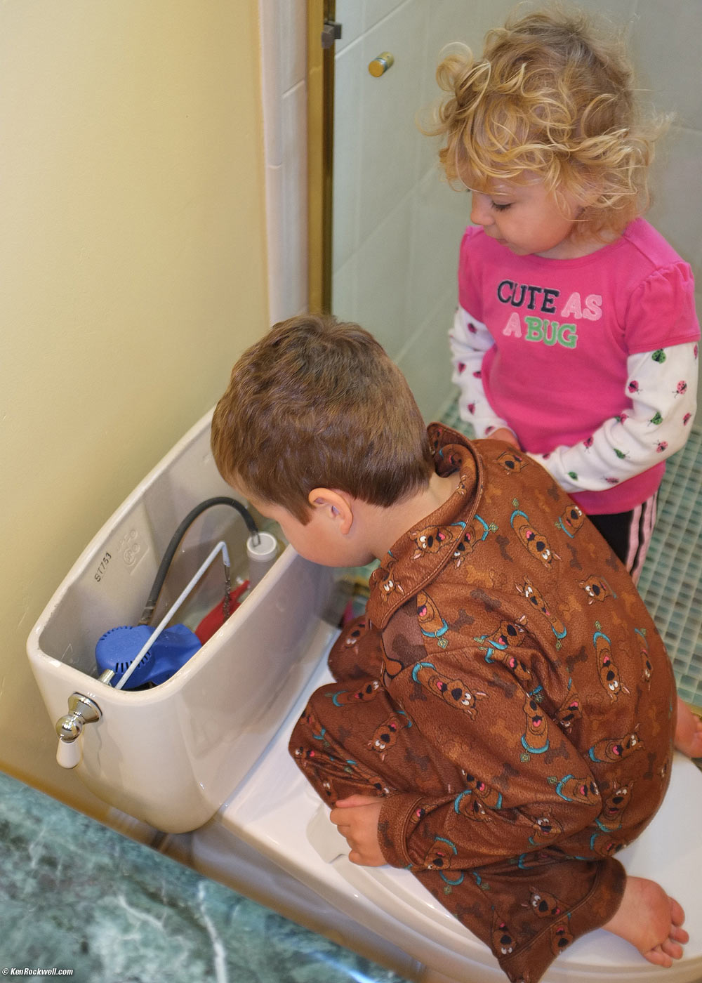 Ryan and Katie changing a flapper valve