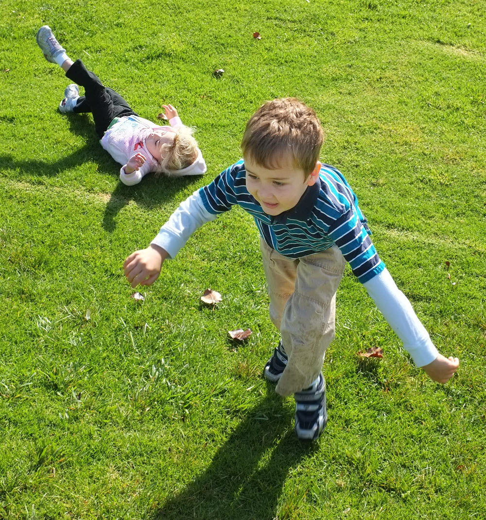 Ryan and Katie playing on the hill at Aviara Oaks