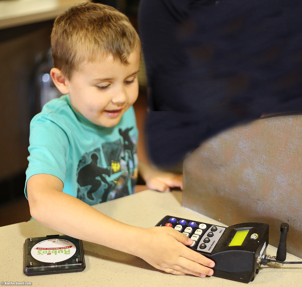 Ryan works the paging system at Rubio's