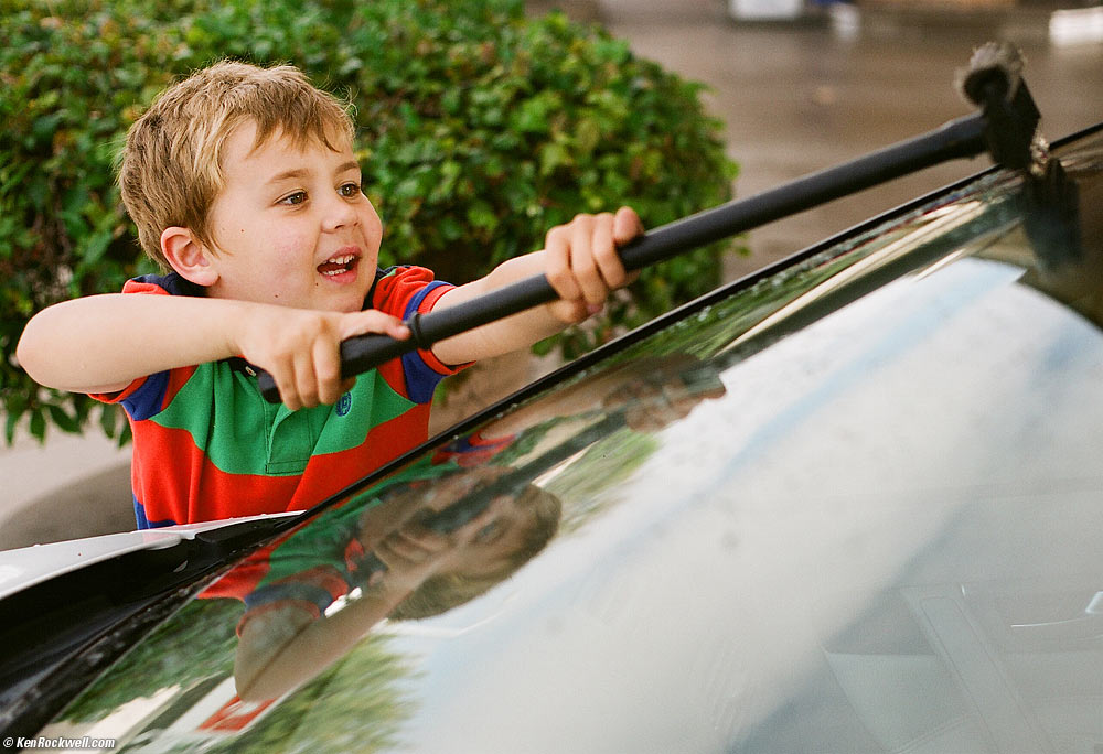 Ryan washing the Volvo window