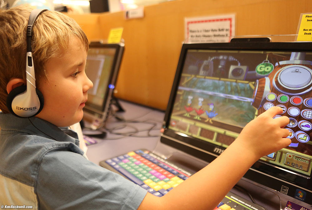 Ryan plays the bird pooper game at the library after school