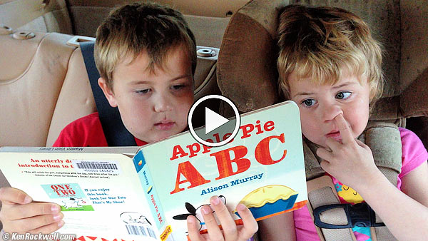 Ryan reads to Katie in the Porsche Cayenne Turbo S