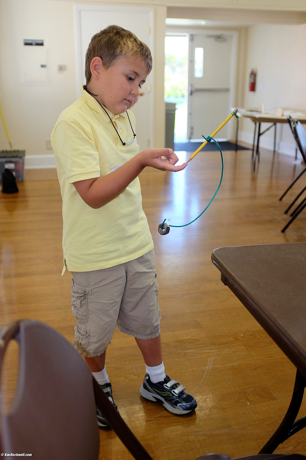 Ryan balances a pencil at Science Camp